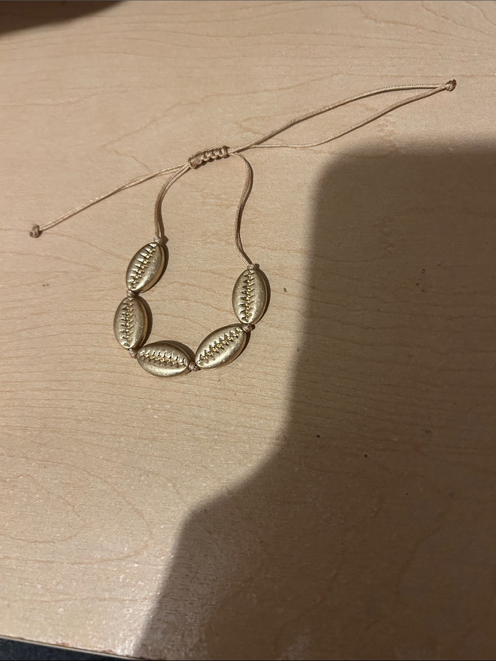 Plunder Gold Cowrie Shell Bracelet with Adjustable Cord